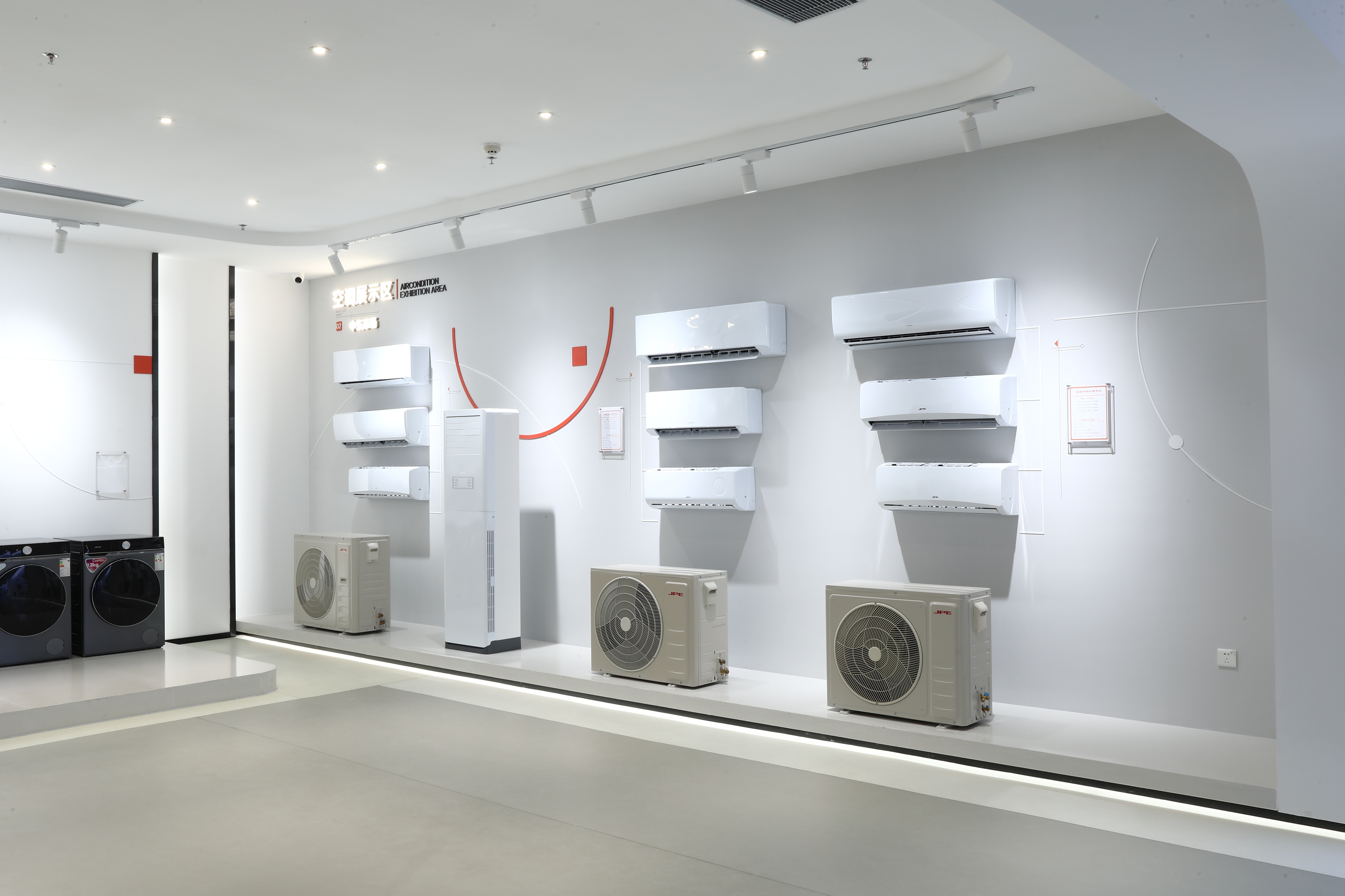 Wall-mounted air conditioner indoor unit with white casing and LED display panel